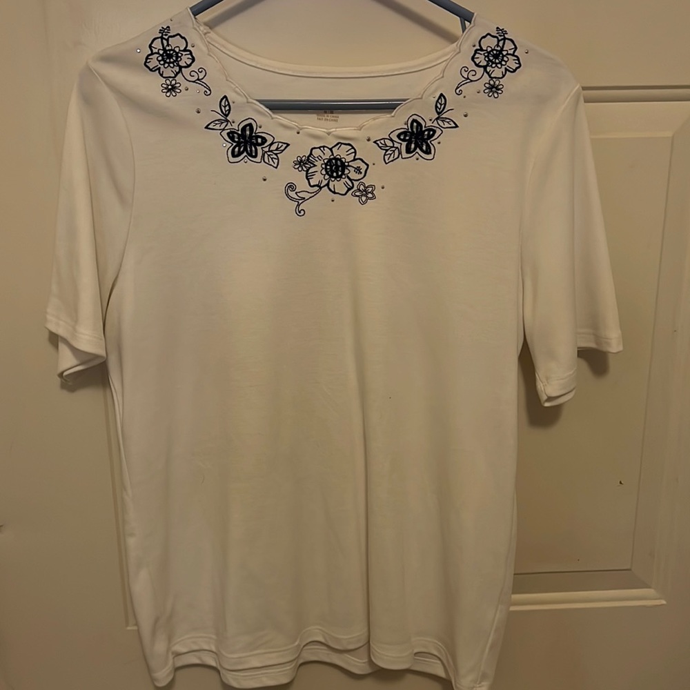 Medium white shirt with black flowers and silver stones